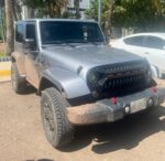 Policías Estatales asegura vehículo americano con placas sobrepuestas