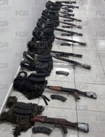 FGR lleva a proceso a 11 personas detenidas con armas, cartuchos, cargadores en Escuinapa FGR lleva a proceso a 11 personas detenidas con armas, cartuchos, cargadores en Escuinapa